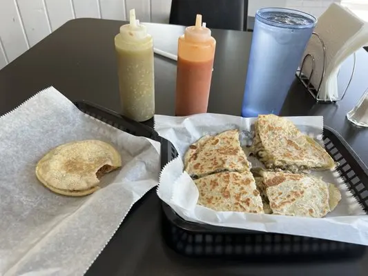 La Sierra Restaurant signature dishes Chicken QuesadillaLa Sierra Mexican HotdogPapas Con Carne